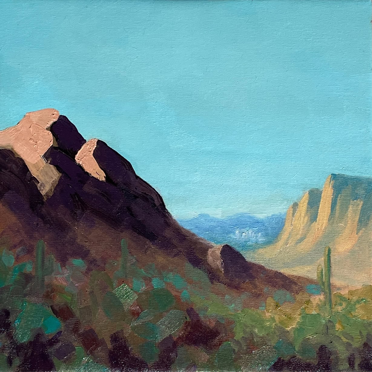 Oil painting of distant downtown Phoenix seen beyond a valley created by two mountains